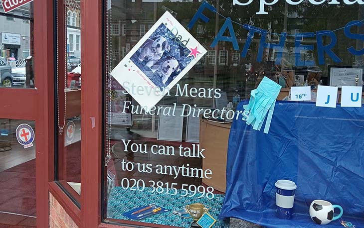 A window display with commemorating father's day
